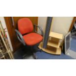 A Modern Three Tier CD Music Centre Stand Together with a Swivel Office Chair