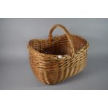 A Wicker Shopping Basket, 41cm Long.