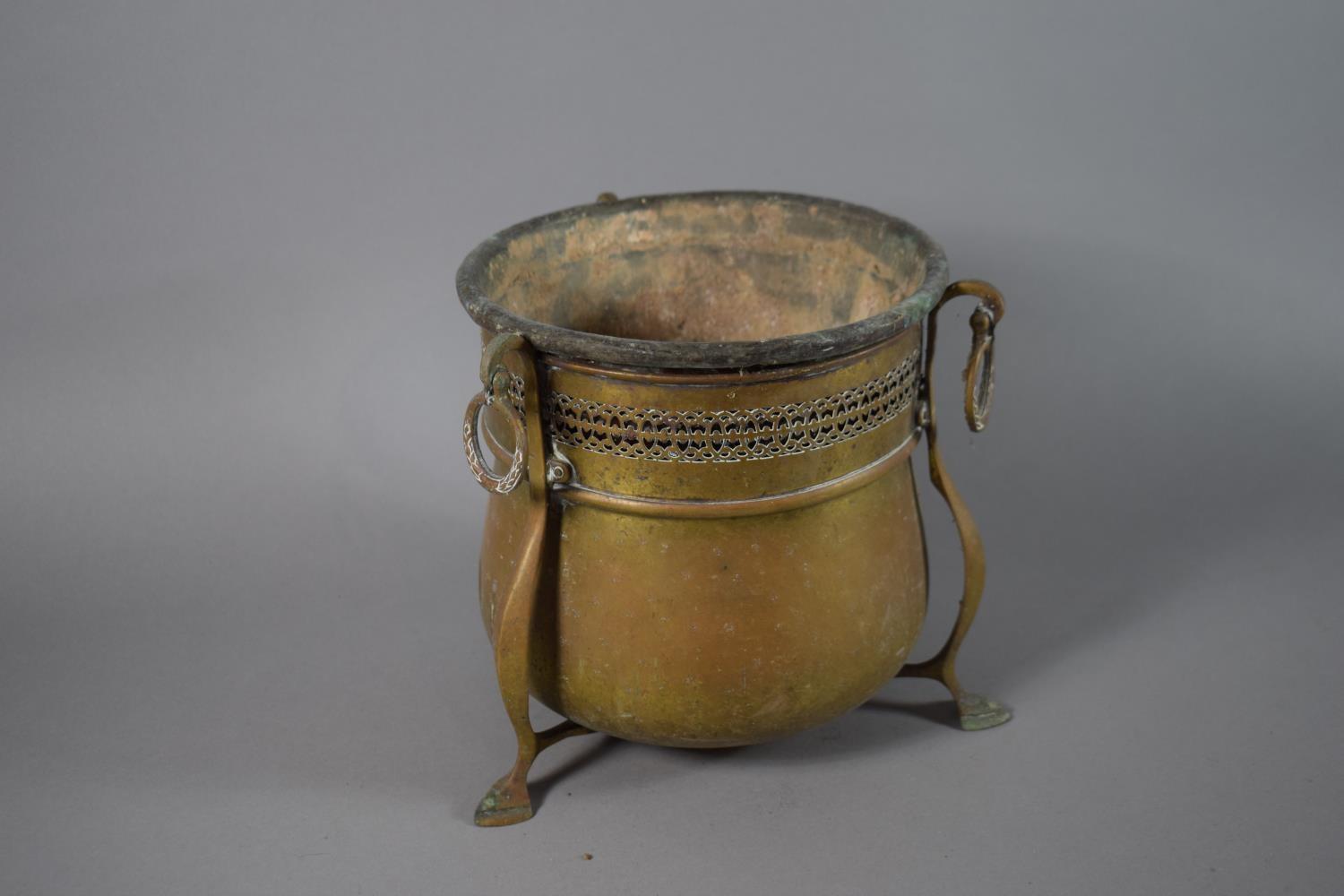 An Arts and Crafts Influenced Brass Planter with Pierced Rim and 3 Supports, Together with Metal