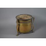 An Arts and Crafts Influenced Brass Planter with Pierced Rim and 3 Supports, Together with Metal