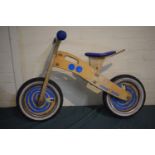 A John Crane "First Bike" Wooden Framed Childs Bicycle.