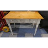 A Pine Side Table with 3 Drawers on Painted Base with Turned Supports, 101cm Wide.