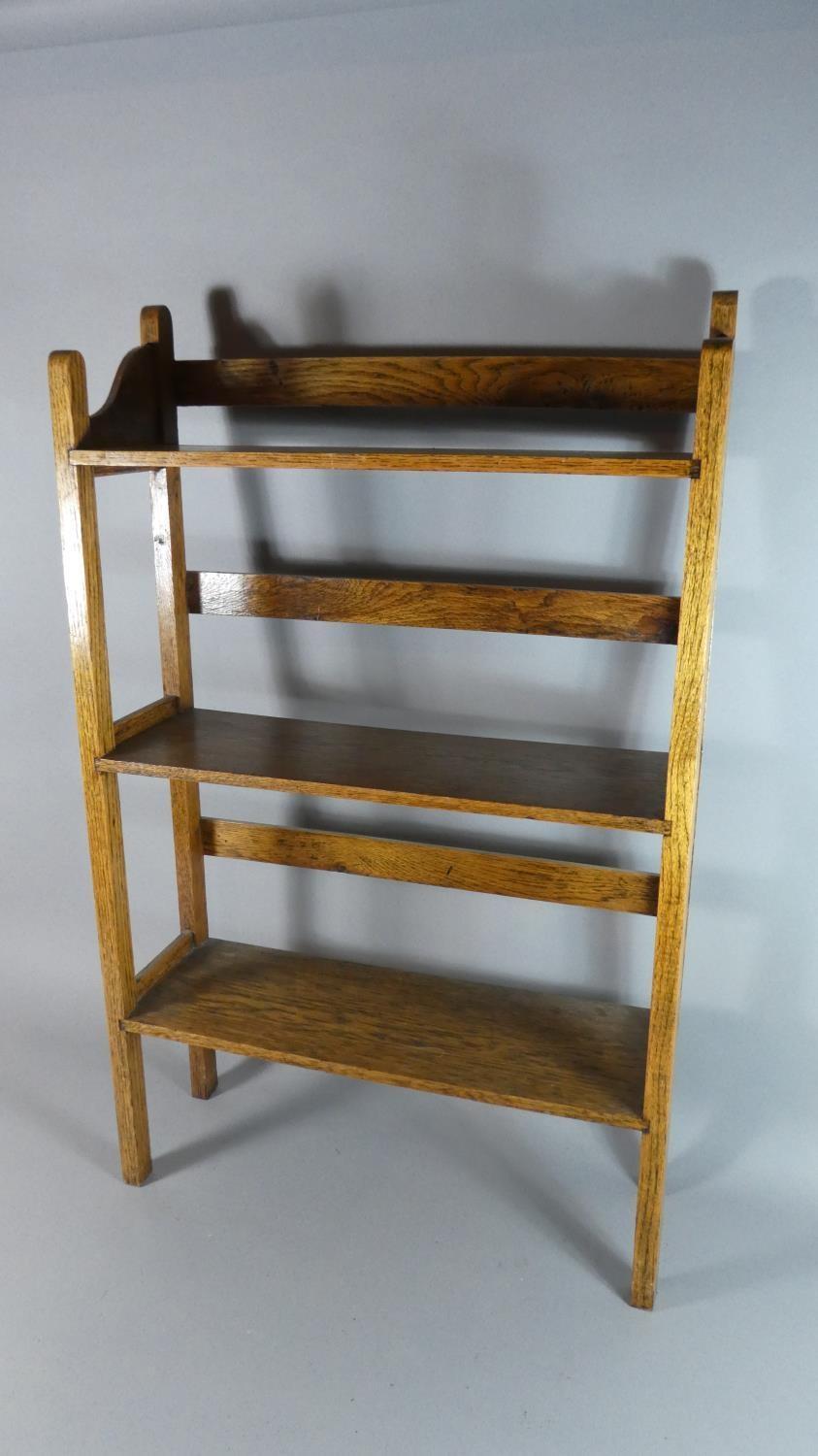 An Edwardian Oak Three Shelf Galleried Bookcase, 55cm Wide.