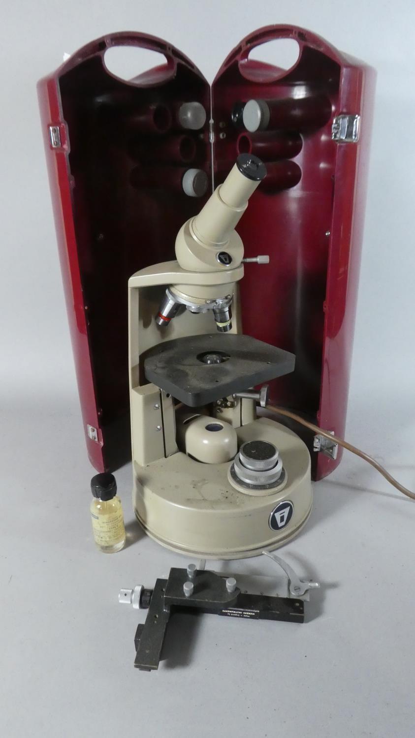 A Vickers Electric Microscope In Original Cylindrical Case.