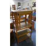 A Three Tier Trolley and Nest of Three Tables, Largest 65cm Wide
