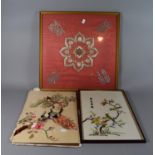 Two Framed and One Unframed Oriental Embroideries in Silk, Birds and Flowers. Tallest 43cm.