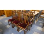 A Harlequin Set of 6 Oak Barley Twist Dining Chairs to Include Pair of Carver Armchairs.