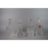 A Collection of 3 Decanters and a Bottle.