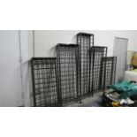 A Hand Made Wrought Iron Five Section Wine Rack for Wall Mounting, 253cm Wide And Center Section