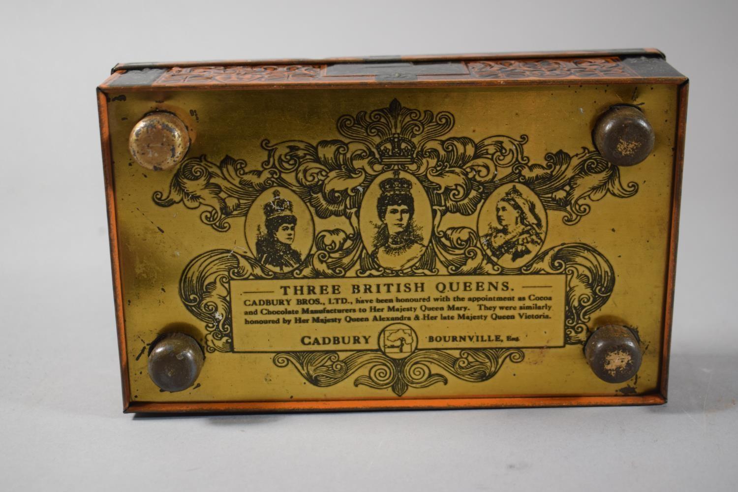 A Vintage Cadbury Tin, "Three British Queens" Containing Two Amber Cheroot Holders, Matchbox Leyland - Image 7 of 7