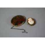 An Oval Cameo Brooch Set in Yellow Metal Rope Twist Surround Together with a White Metal Mounted