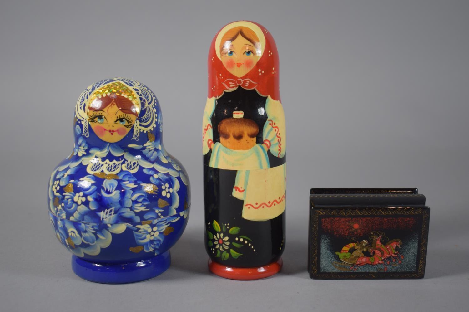 A Russian Lacquer Snuff Box of Sarcophagus Form, a Single Doll Containing Spirit Miniature Bottle