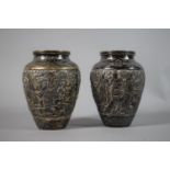 A Pair of Persian Silver Vases Decorated in Relief with Hunting Party, Musicians and Dancing Girl,