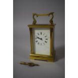 An Early 20th Century Brass Cased Carriage Clock with Bevelled Glass Having Roman Numeral Chapter