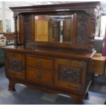 An Arts and Crafts/Nouveau Influenced Edwardian Mahogany Mirror Back Sideboard Having Two Centre
