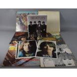 A Collection of Beatles Related Items to Include Four Photographs, 'Beatles Unseen Archives' Book,