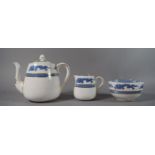 A Crown China Three Piece Blue and White Tea Service, Rd.no. 630163 and Retail Mark for Goode and