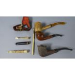 A Collection of Vintage Pipes and Cheroot Holders