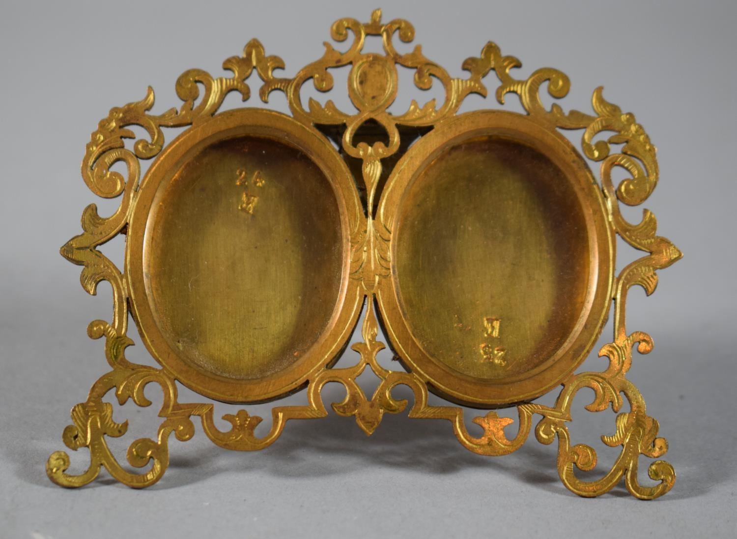 A Miniature Gilt Metal Double Photo Frame in the French Style, 9cm Wide