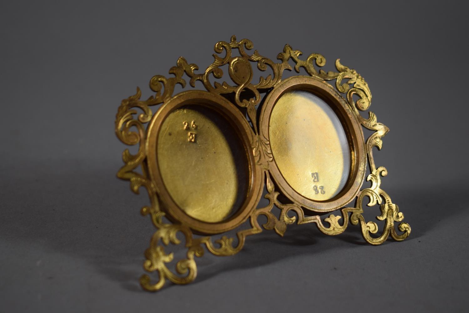 A Miniature Gilt Metal Double Photo Frame in the French Style, 9cm Wide - Image 2 of 3