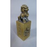 A Small Chinese Bronze Rectangular Seal with Foo Dog Finial, 6.25cm high