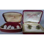 A Pair of Gents Silver Cuff Links with Engine Turned Decoration and a Gilt Pair Decorated with