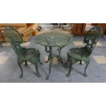 A Green Painted Pierced Metal Garden or Patio Set Comprising Circular Table and Pair of Chairs