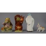 Two Beswick Potter Figures, A Royal Worcester Candle Snuffer "Toddie" and a White Rabbit Cake