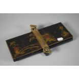 A Novelty Chinoiserie Lacquered Tie Press, "The Agrippa Press" 26.5cm Long