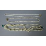 A Collection of Two Pearl Necklaces with Gilt Clasps and a Double String with Jewelled Mounts