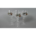 A Set of Three Amber and Silver Mounted Port Glasses
