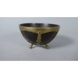 An Early 19th Century Coconut Shell with Brass Surround and Three Brass Feet to Form Small Bowl, 8.
