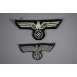 Two WWII Nazi Cloth Tunic Eagle Badges