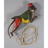 A German Tin Plate Climbing Monkey Toy 'Tom No.385' by Lehmann.