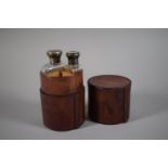 A Victorian Cylindrical Leather Field Flask Case Containing Two Silver Mounted Glass Bottles, London
