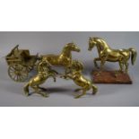 A Collection of Four Heavy Brass Horse Ornaments to Include Horse and Cart.