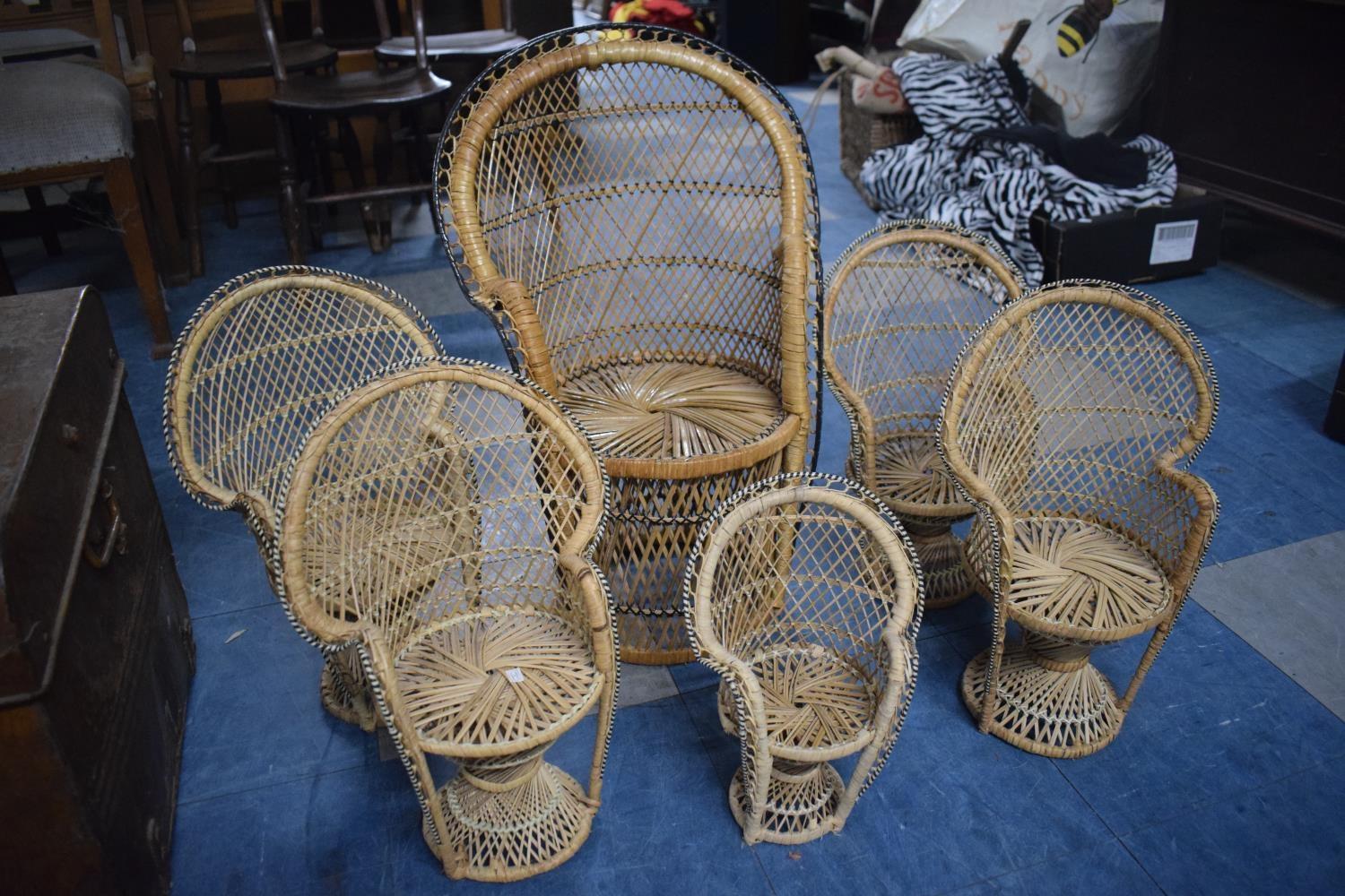 A Collection of Six Dolls Wicker Peacock Chairs.