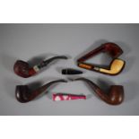 A Collection of Four Vintage Pipes and Two Cheroot Holders.
