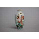 A Miniature Chinese Scent or Medicine Bottle depicting Immortal Holding a Leaf. 5.25cms High