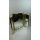 A Brass Framed Folding Triple Mirror.