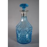 An Edwardian Silver Mounted Blue Glass Decanter. Sheffield, 1928, William Hutton & Son. 27.5cm High.