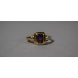 A 9ct Gold Art Deco Style Ring with Inset Amethyst, 2.8g.