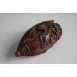 A Carved Prisoner of War Coquilla Nut Snuff Bottle Depicting Husband and Wife