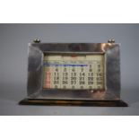 An Edwardian Silver Mounted Desk Calendar with Cards, Engine Turned Decoration, 21cm Wide.