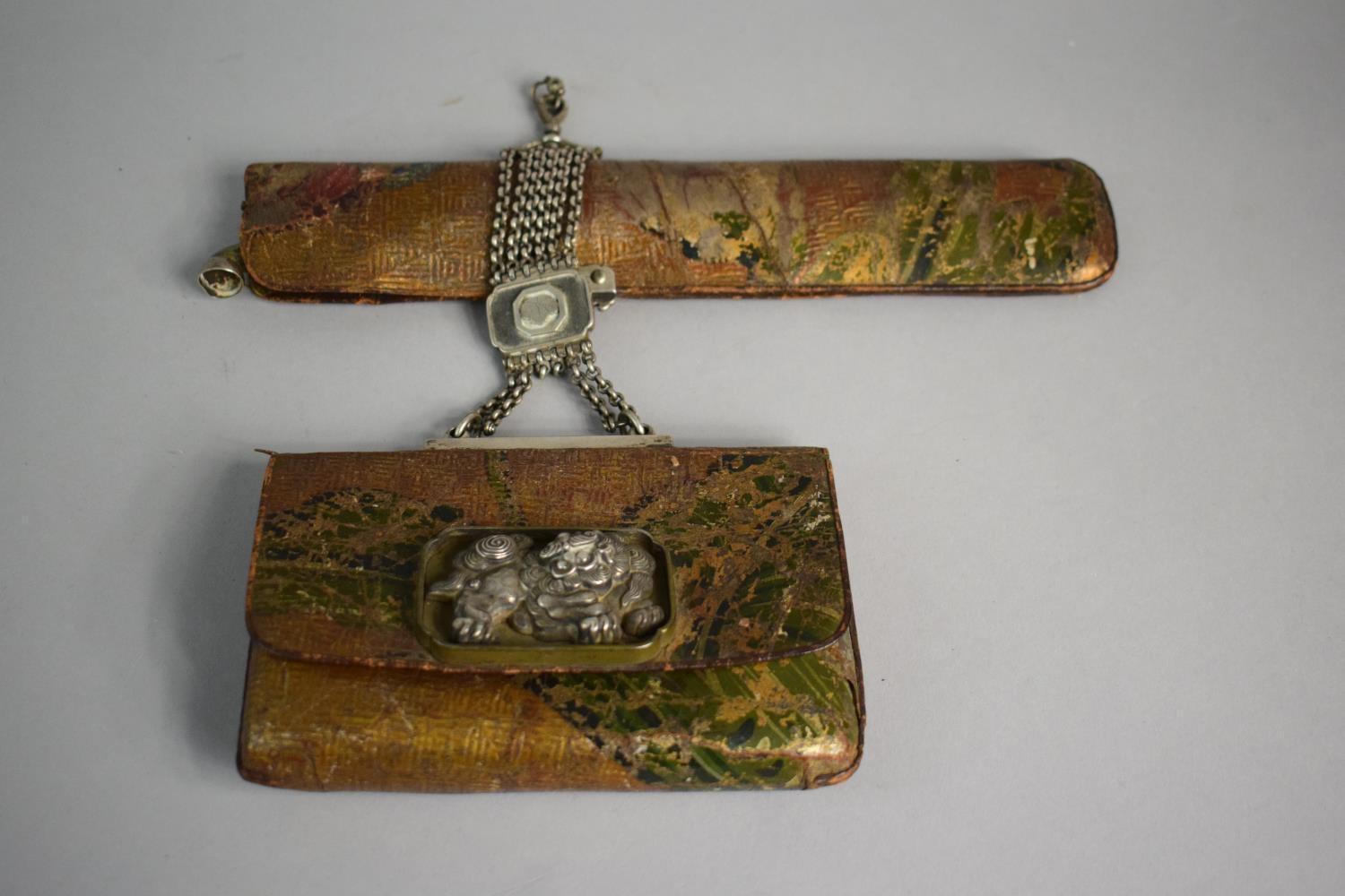 A Meiji Period Japanese Kiseru and Tooled and Gilded Leather Tobacco Pouch with White Metal Temple - Image 2 of 3