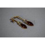 A Pair of 9ct Gold and Amber Drop Earrings. Gross Weight 2.9g.