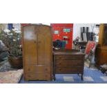 An Edwardian Oak Three Drawer Chest and A Mid 20th Century Oak Gents Fitted Wardrobe.