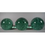 Three Victorian Green Glass Dumps with Interior Bubbles, 11-12cm High.