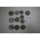 A Collection of Thirteen Nazi German Coins.