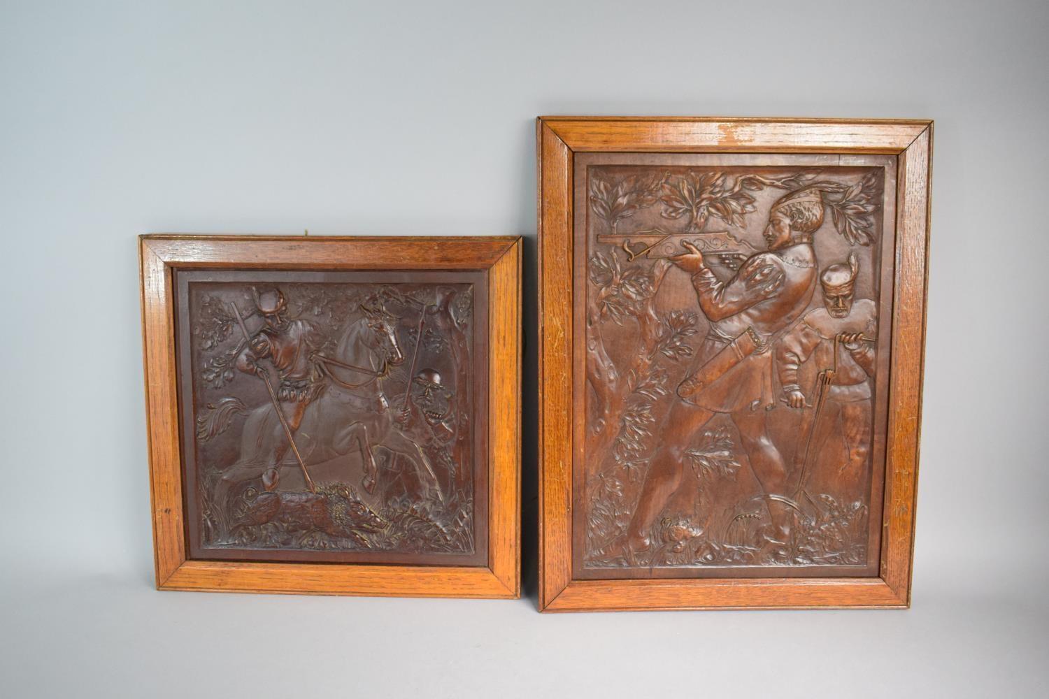 Two Good Quality Oak Framed Continental Carved Walnut Panels Depicting Huntsman with Crossbow